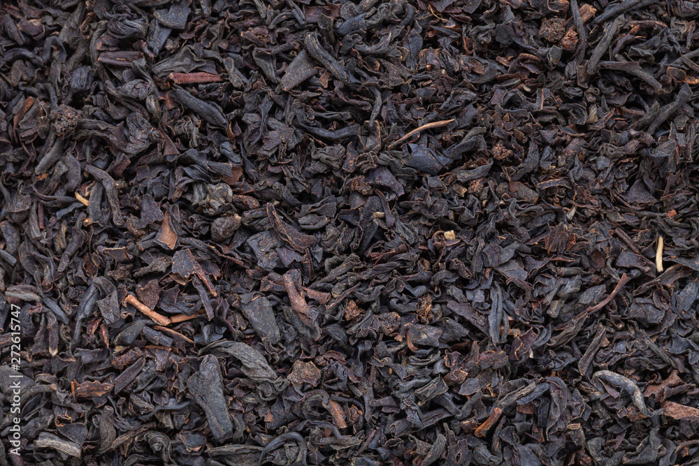 Black tea leaves texture close up for background