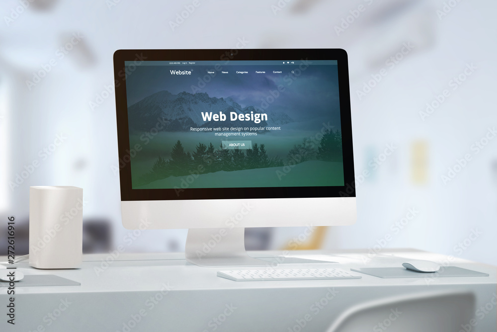 Office desk with modern computer monitor and responsive web site off web design studio presentation. Office desk with modern computer monitor and responsive web site off web design studio presentation.