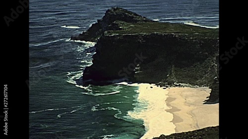 Aerial view of Cape of Good Hope in South Africa, looking towards the west, from the coastal cliffs above Cape Point, overlooking Dias beach. Archival of Cape Town city of South Africa in 1980s