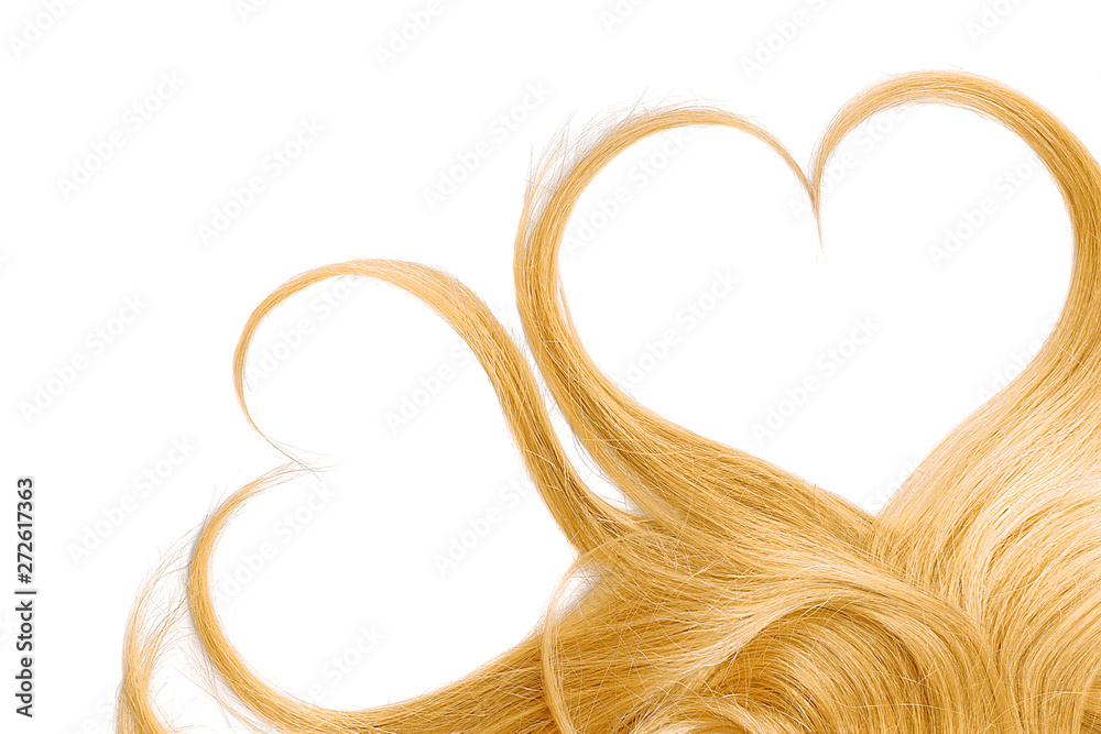 Blond hair isolated on white background. Heart shape