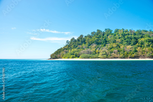 Beautiful landscape of blue sea water and tropical island with beach © Pavlo Vakhrushev