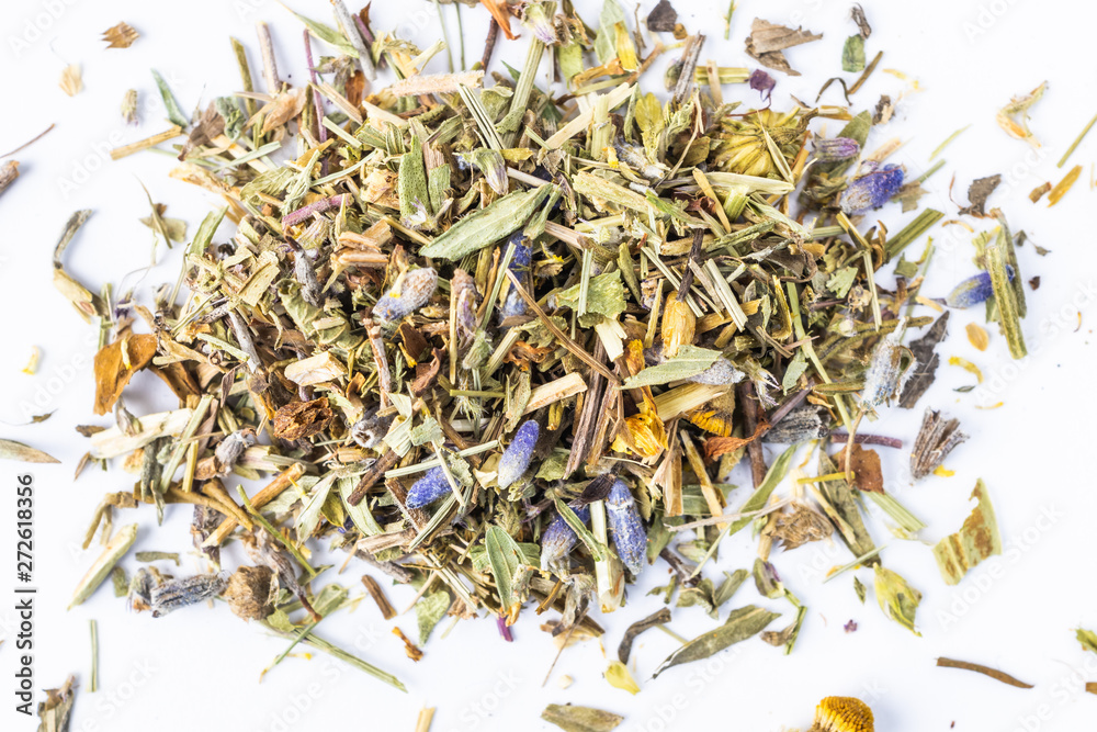 Herbal tea scattered on a white background. Thyme herbs, lavender, chamomile, juniper, St. John's wort. Top view, macro, flat lay, minimalism. Useful vitamin herbal collection. Copy space. Herbal tea scattered on a white background. Thyme herbs, lavender, chamomile, juniper, St. John's wort. Top view, macro, flat lay, minimalism. Useful vitamin herbal collection. Copy space.