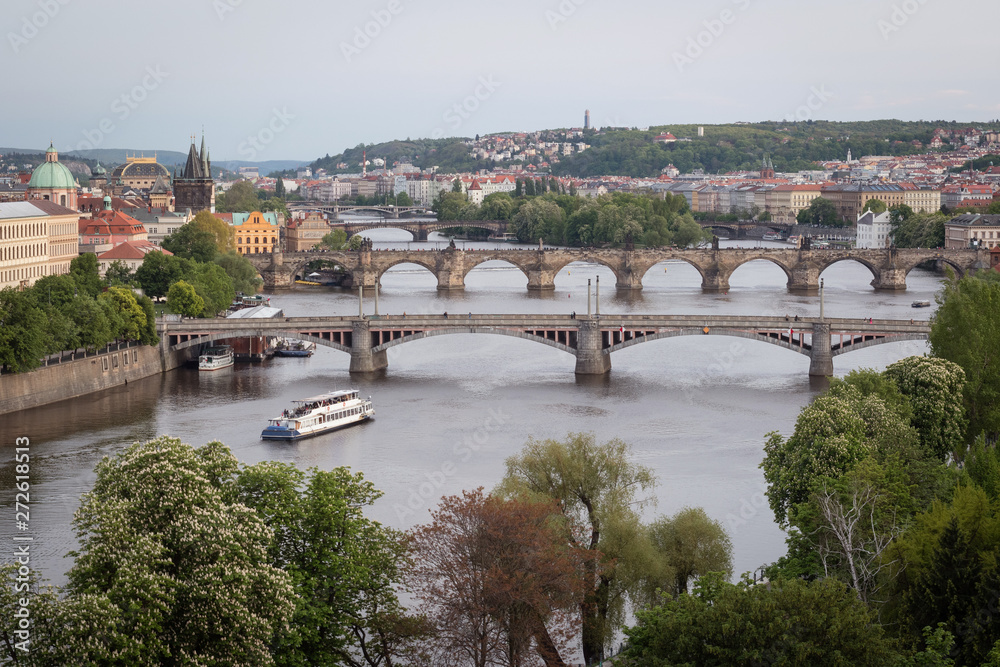 Bridges of Prague over Vltava River at dusk. Scenic view from Letna Hill in Prague, Czech Republic
