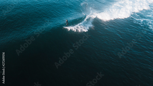 Aerial View of Waves and Surfers and Beach Landscape of Bells Beach Along the Great Ocean Road, Australia © Judah