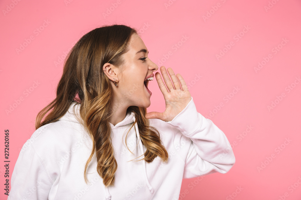 Side view of Happy screaming woman wearing in casual clothes Side view of Happy screaming woman wearing in casual clothes