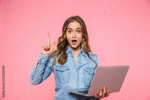 Tapeta Surprised blonde woman wearing in denim shirt having idea