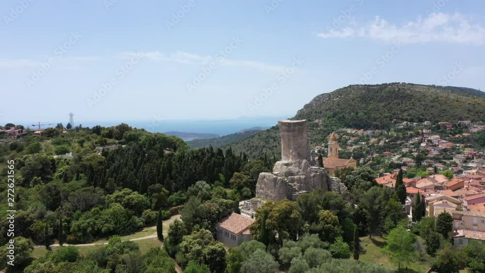 the Trophy of Augustus in la Turbie aerial drone shot discovering mediterranean sea in background sunny day France the Trophy of Augustus in la Turbie aerial drone shot discovering mediterranean sea in background sunny day France