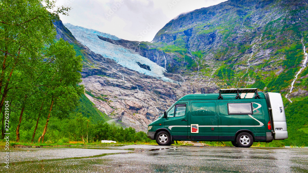Camper van and Boyabreen Glacier in Norway