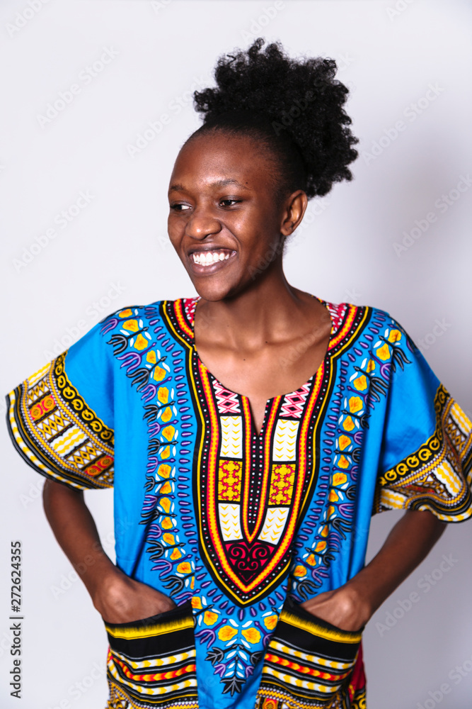 African girl standing puts her hands in pokets African girl standing puts her hands in pokets
