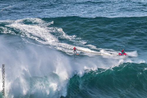 Canvas Print surfing competition in nazare