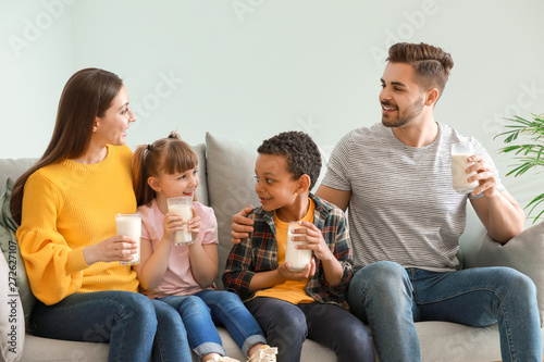 Young family with glasses o...