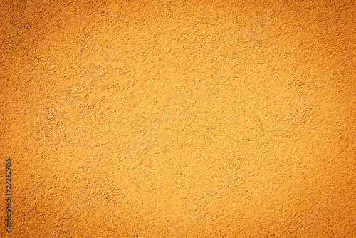 Wallpaper Mural Eine orange Steinmauer mit Vignette als Hintergrund Torontodigital.ca