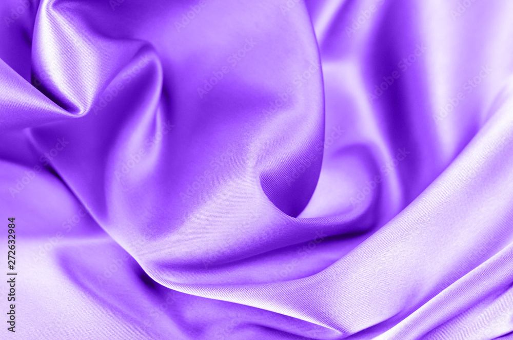 Obraz premium Background from satin fabric of blue color.
