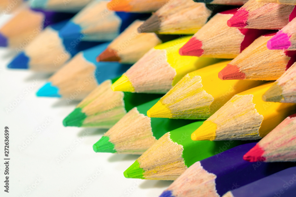 select focus, close up ,Color pencils with copy space on isolated white background select focus, close up ,Color pencils with copy space on isolated white background