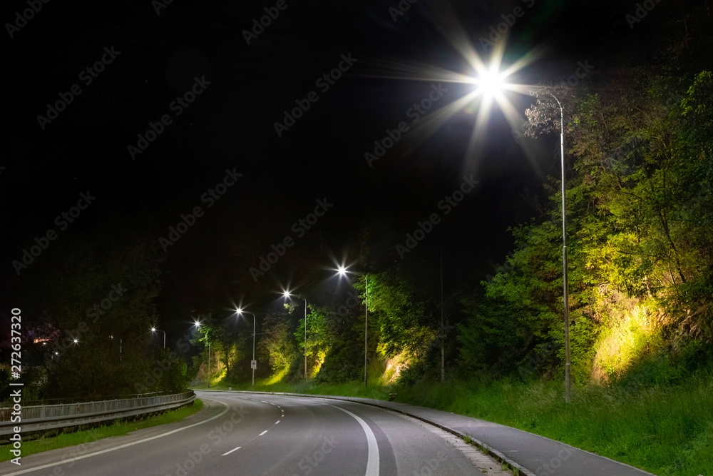 night street with modern led street lights in small city night street with modern led street lights in small city