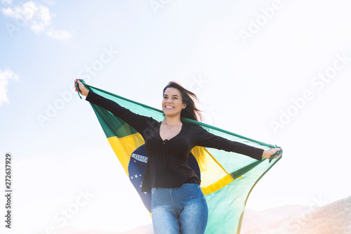 Woman with brazilian flag, independence day photo