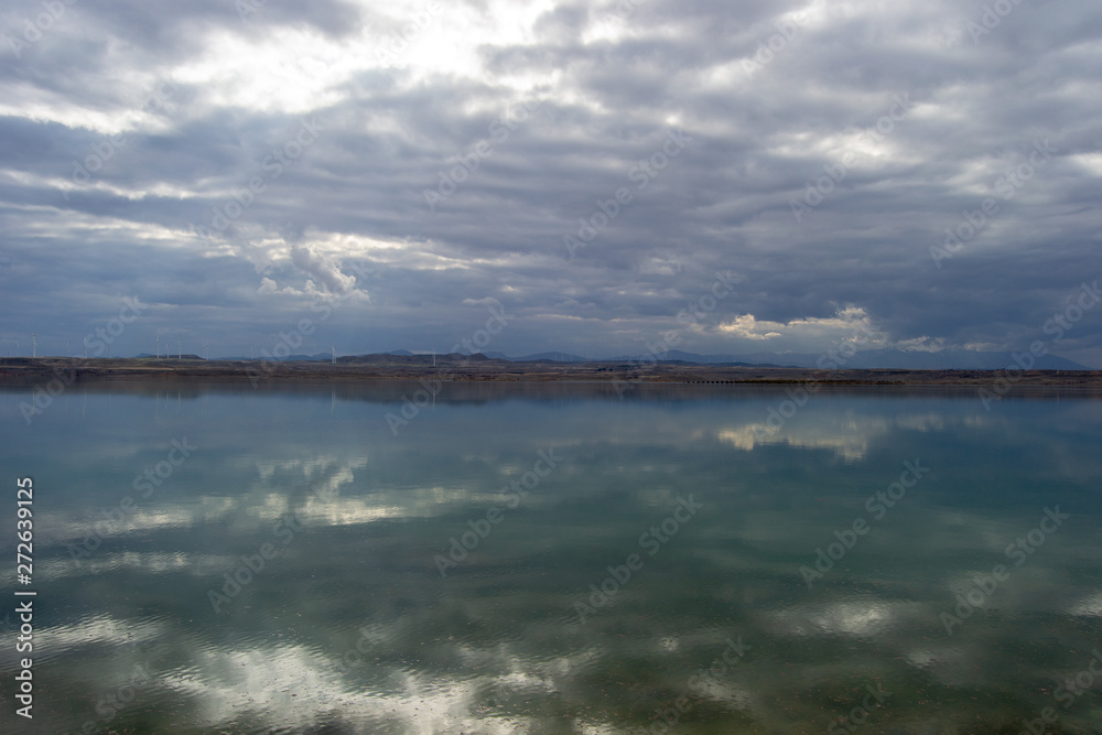 Sotonera lake landscape at cloudy day with nice reflections