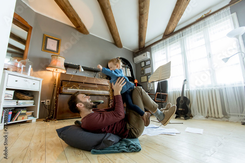 Happy young family playing ...