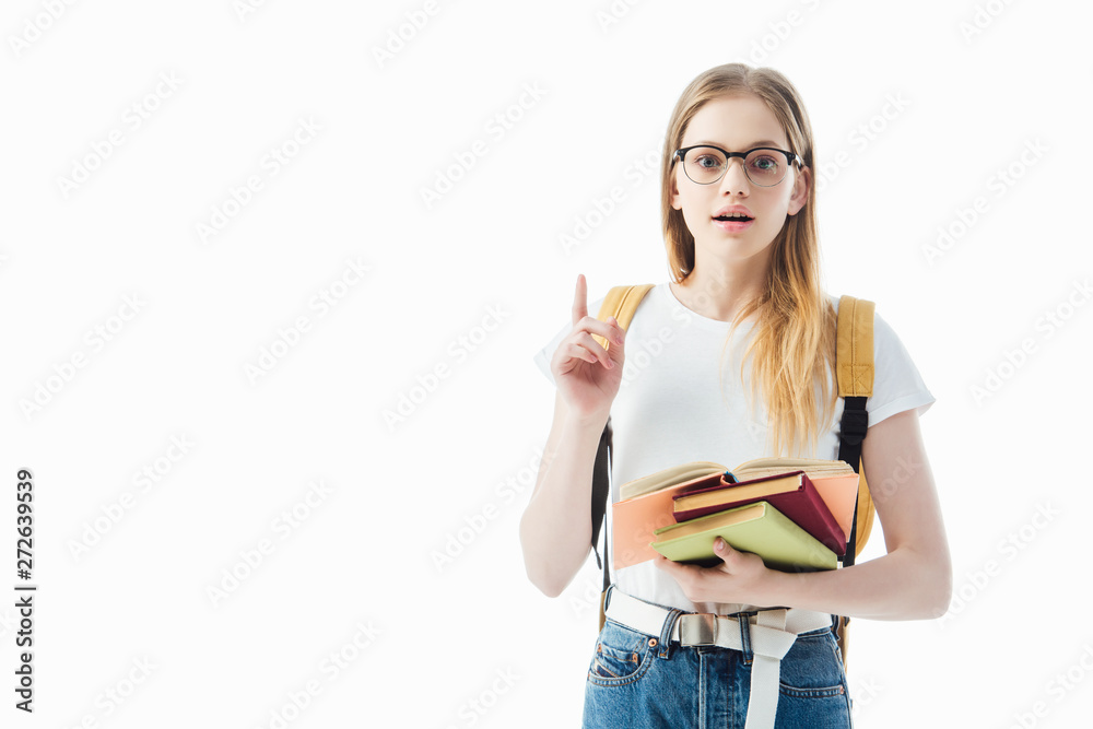 excited schoolgirl with books and backpack showing idea gesture isolated on white excited schoolgirl with books and backpack showing idea gesture isolated on white