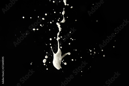 white shaving foam on black background