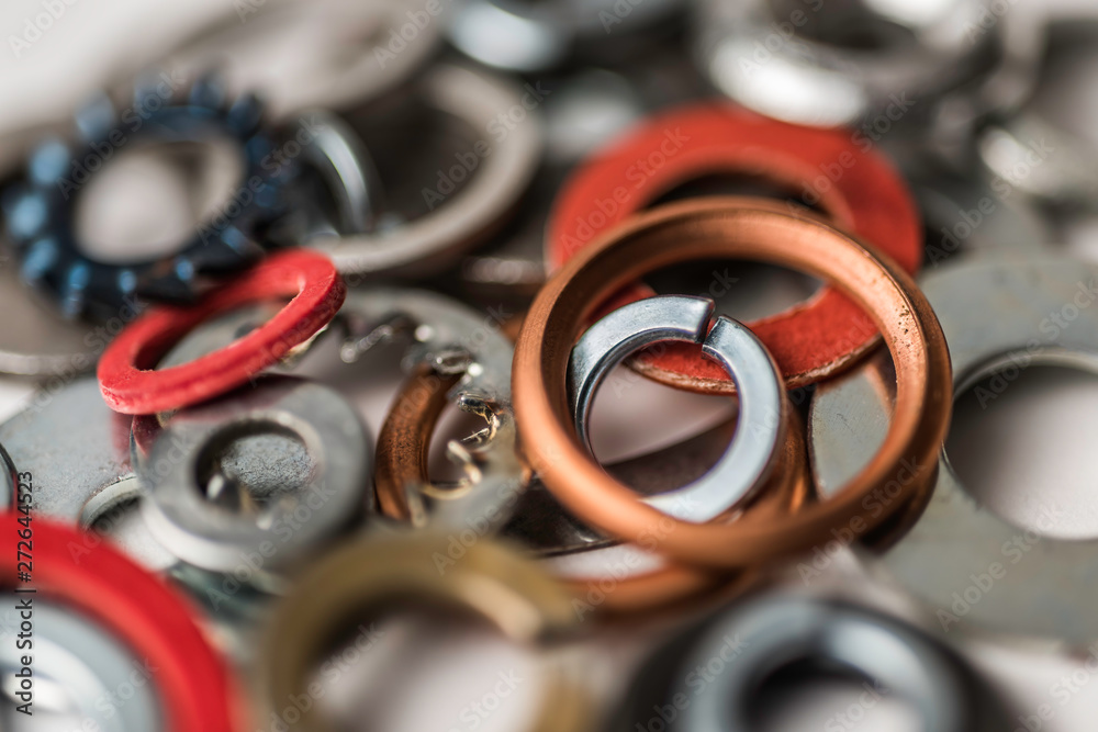Divers industrial washers and rings. Various colorful washers rings on white background Screw washer Divers industrial washers and rings. Various colorful washers rings on white background Screw washer