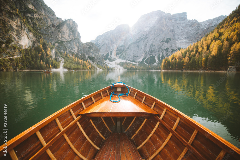 Traditional rowing boat at Lago di Braies in the Dolomites