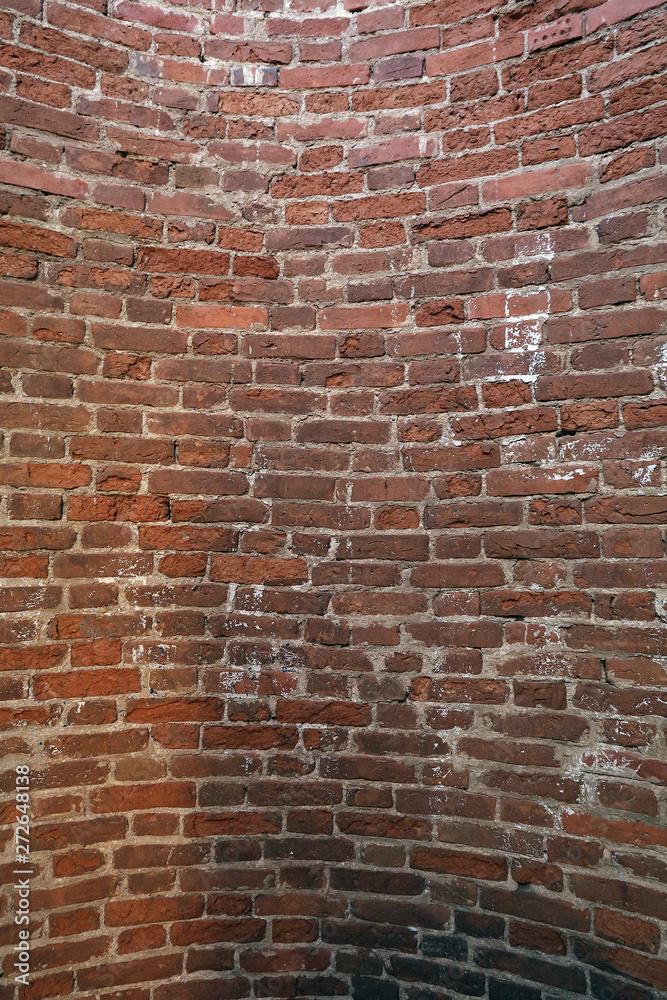 Fototapeta premium fragment of old red brick wall