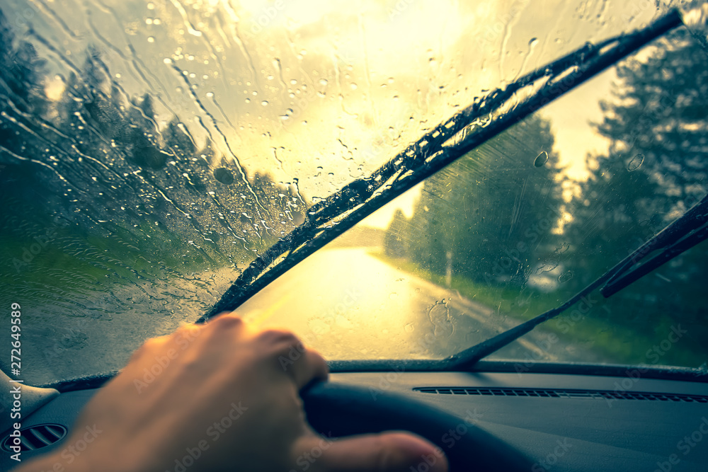 View from the car's cab at rain. Photo from Finland. - obrazy, fototapety, plakaty 