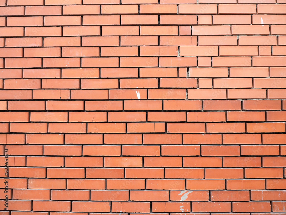 Background wall of brown smooth bricks. Copy space... Background wall of brown smooth bricks. Copy space...