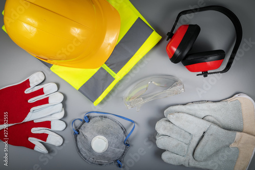 occupational safety and health - work safety items of construction industry on gray background photo