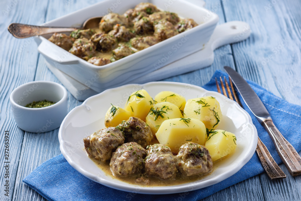 Swedish meatballs  with creamy gravy and boiled potatoes.