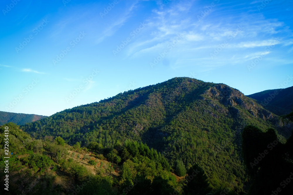 View over the valley and mountains in Saint Melany, Ardeche, France View over the valley and mountains in Saint Melany, Ardeche, France