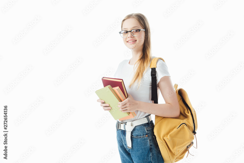 smiling schoolgirl with backpack holding books isolated on white smiling schoolgirl with backpack holding books isolated on white