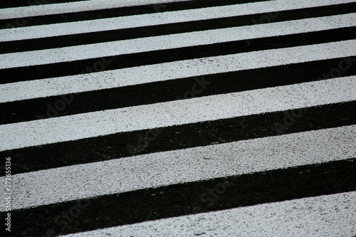 zebra crosswalk on a asphalt road background