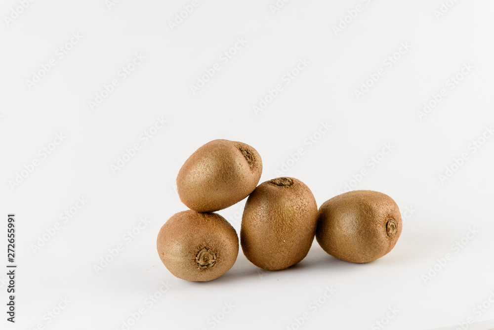 Kiwi fruit slices on white background. Citrus fruit. Healthy freshness food. Green summer fruits with vitamin Kiwi fruit slices on white background. Citrus fruit. Healthy freshness food. Green summer fruits with vitamin