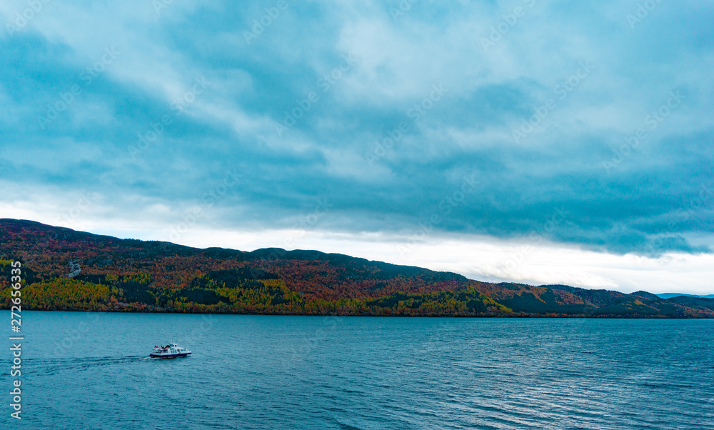 Natural landscape of lake view with mountain and boat Natural landscape of lake view with mountain and boat