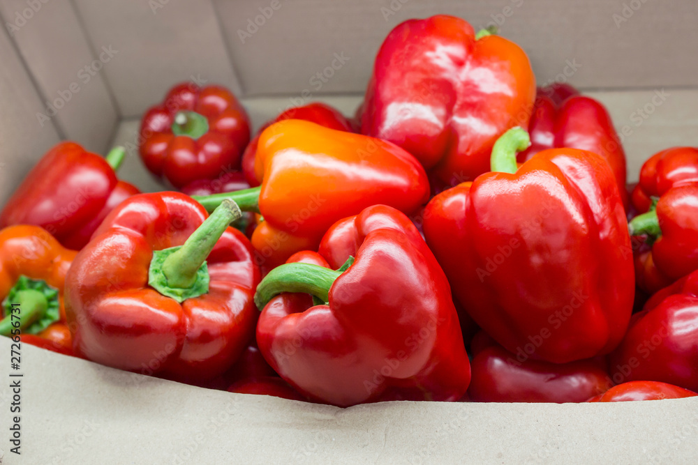 juicy redpaprika in a cardboard box juicy redpaprika in a cardboard box