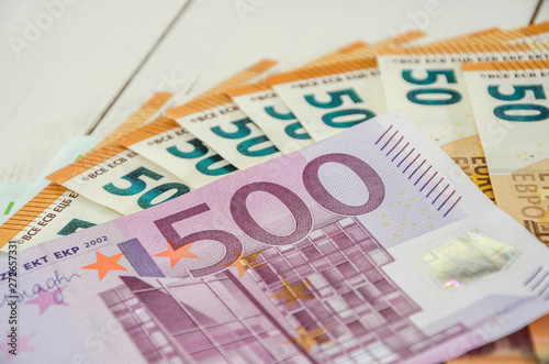 500 and 50 Euro banknotes close up on the table