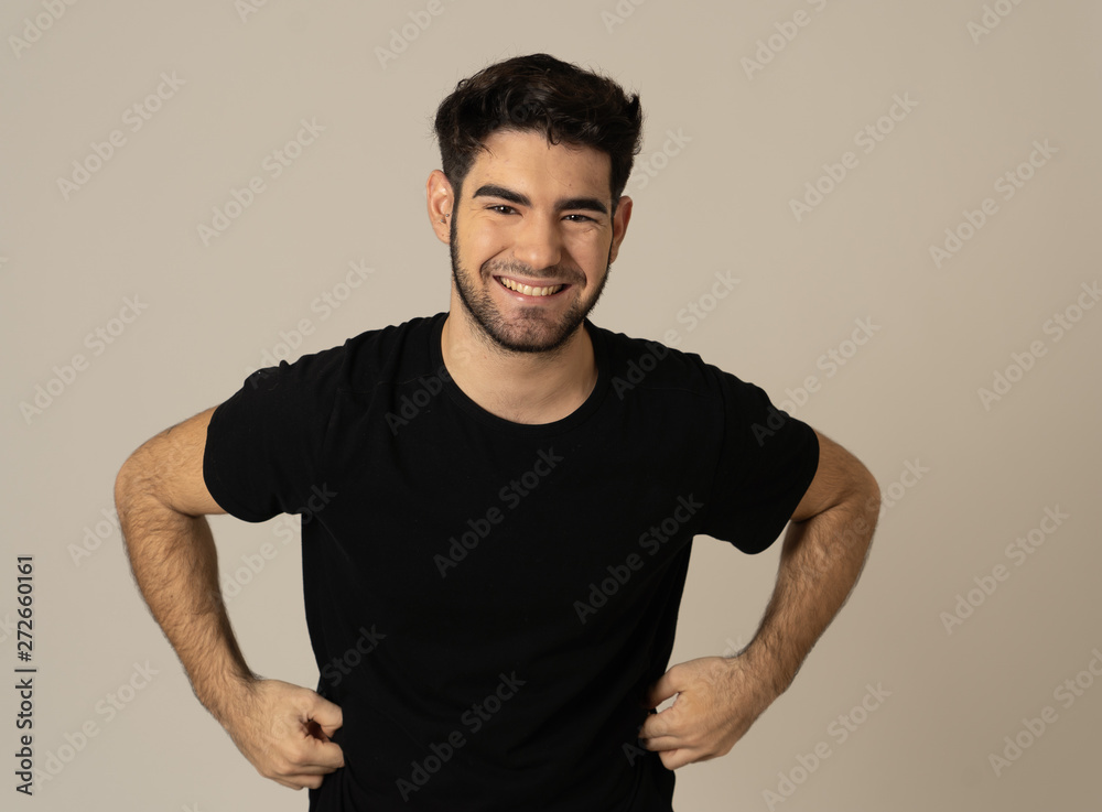 Human expressions and emotions. Joyful young attractive man smiling with happy face Human expressions and emotions. Joyful young attractive man smiling with happy face