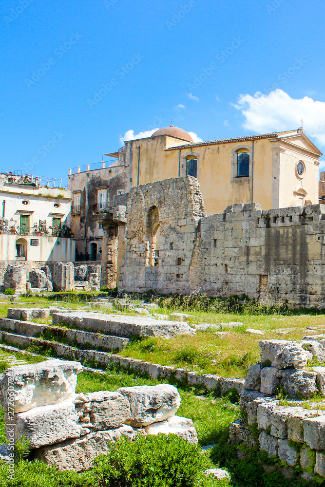 Historical ruins of Temple of Apollo in Ortigia Island, Syracuse, Sicily, Italy. Ancient Greek monument, significant archaeological site. Popular tourist place. Temple ruins