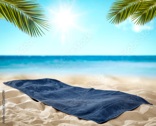 Summer towel on beach and free space for your decoration. Summer time  #272660799