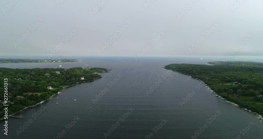 Aerial view of Narragansett Bay near Jamestown, Rhode Island ascending into clouds Aerial view of Narragansett Bay near Jamestown, Rhode Island ascending into clouds