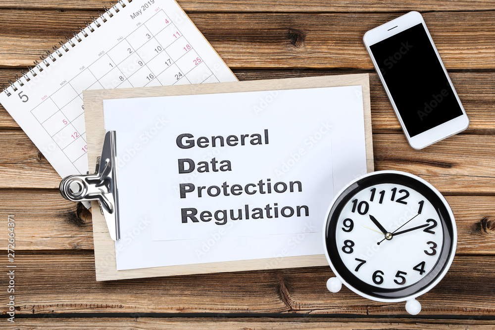 General Data Protection Regulation, GDPR with smartphone and round clock