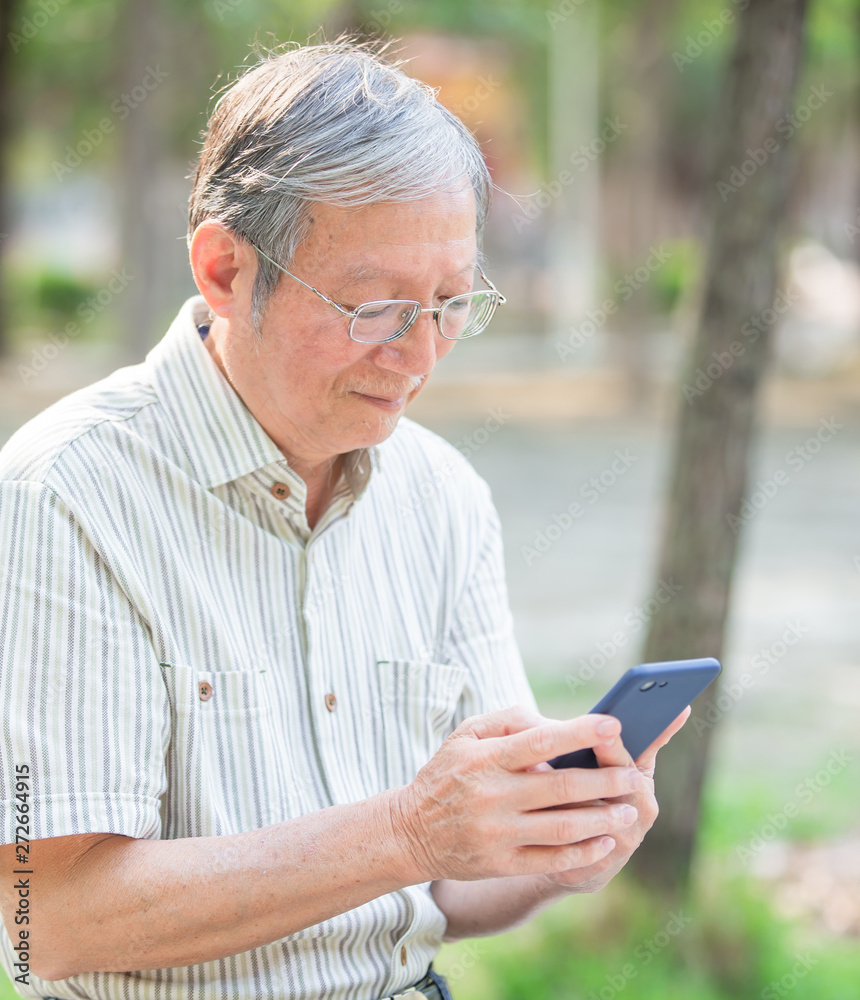 Older man use cellphone Older man use cellphone