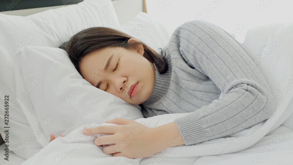 Asian Women Are Sleeping But Insomnia Caused By Migraine Accumulation asian-women-are-sleeping-but-insomnia-caused-by-migraine-accumulation