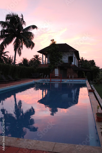 Swimming pool at sunset