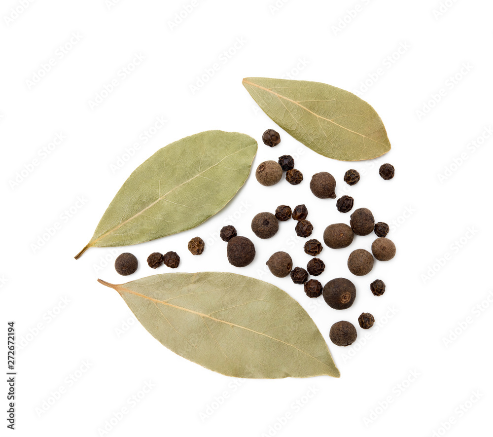 Bay leaf, allspice and pepper isolated on white background Bay leaf, allspice and pepper isolated on white background