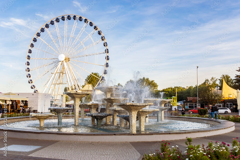 Famous fountain with mill wheel in Gdynia Famous fountain with mill wheel in Gdynia