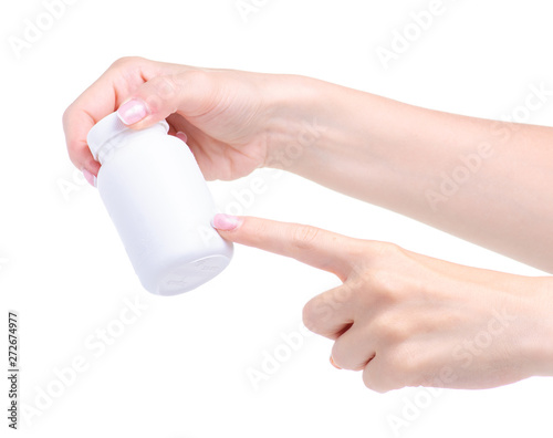 White jar of pills medicine pharmacy in hand on white background isolation