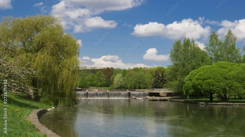 Waterfall in a city park, time lapse. Waterfall in a city park, time lapse.